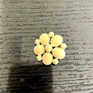 Brooch. NWOT.  Ivory color.  Goes well on dresses & jackets